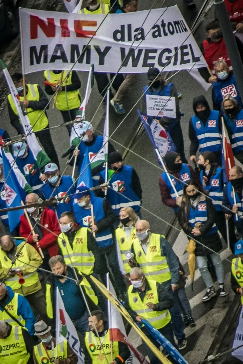 Overhead view of protesters carrying a NIE dla atomu MAMY WEGIEL banner